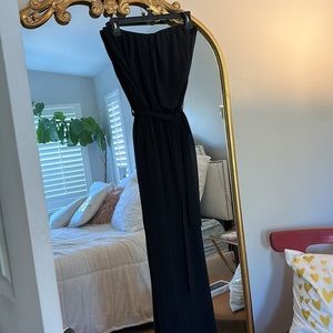 Beautiful strapless sheer black jumpsuit with lining to thigh.